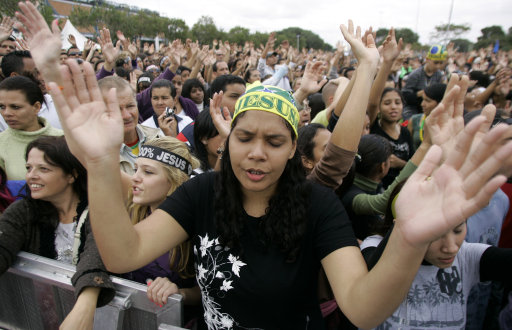 Brazil Religion Evangelical protestants pray during the annual March for Jesus in Sao Paulo, Thursday, June 3, 2010. More than one million people attended the event, organizers said. (AP Photo/Nelson Antoine)