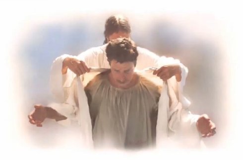 Jesus-putting-robe-on-person