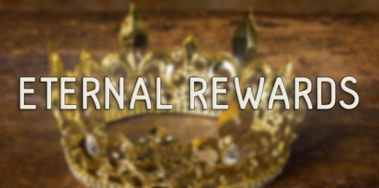 Medieval style golden crown on antique wooden background